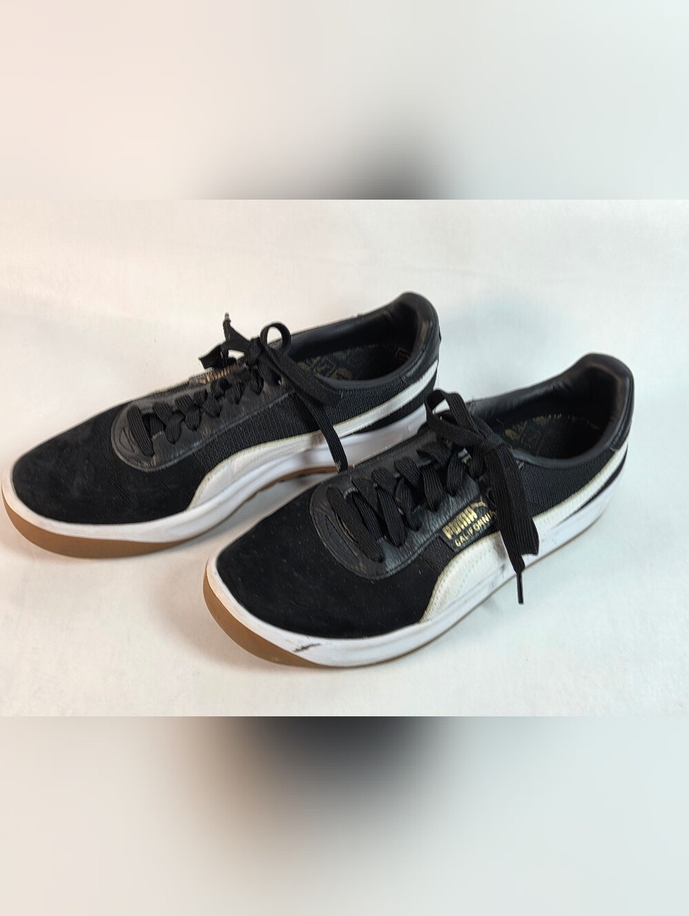 Puma Men's Black Low-Top Sneakers with White Stripe
